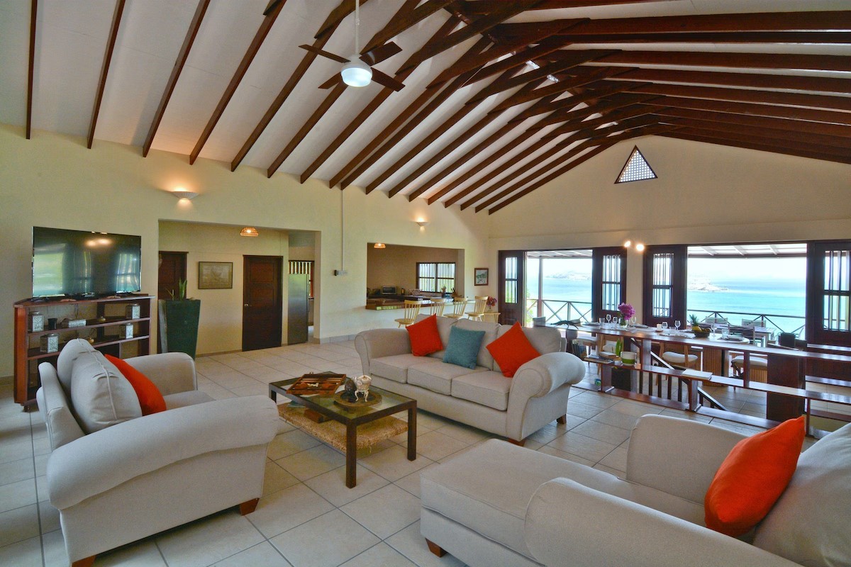 Grand Living Room Spacious open living room at Villa Marisol with vaulted ceiling and sea views
