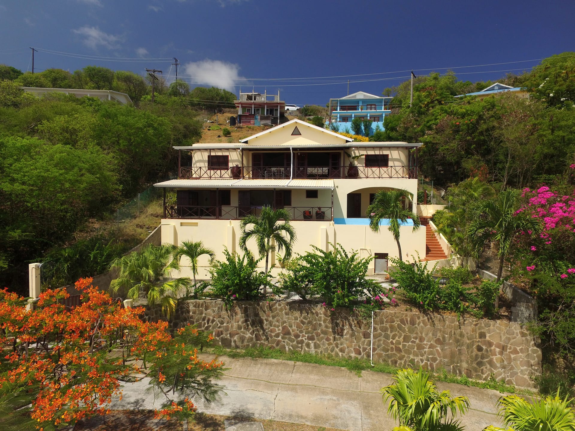 Villa Exterior Villa Marisol exterior with tropical gardens and bougainvillea